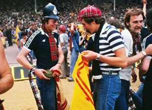 Images Dated 25th July 2013: Scotland fans take turf from the Wembley pitch - 1977 British Home Championship