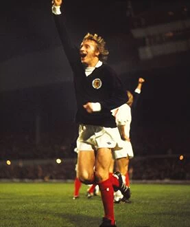 Images Dated 14th April 2011: Scotlands Denis Law celebrates qualification for the 1974 World Cup