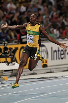 Athletics Collection: Usain Bolt anchors Jamaica to World Championship relay gold & a new WR