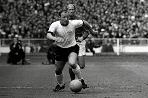 1966 England Gallery: Uwe Seeler of West Germany on the ball during the 1966 World Cup final +