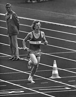 Images Dated 1st February 2012: West German student Norbert Sudhaus runs into the stadium as a prank at the end of the marathon at the 1972 Munich Olympics