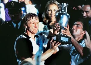 Images Dated 17th January 2012: West Germanys Horst Hrubesch and Hans Mueller lift the trophy at Euro 1980