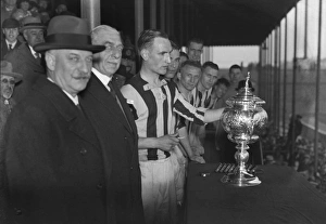 William Cuff presents WBA reserve captain Bob Finch with the Central League trophy in 1933 William Cuff presents WBA reserve captain Bob Finch with the Central League trophy in 1933