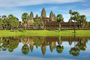 Buddhist Architecture Collection: Angkor Wat Temple and reflection in lake in Siem Reap, Cambodia