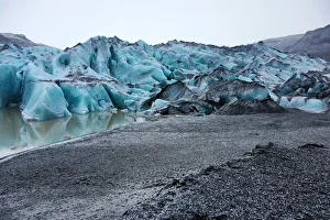 Blue ice of the Solheimajokull Glacier, part of the Myrdalsjokull Icecap on the south Blue ice of the Solheimajokull Glacier, part of the Myrdalsjokull Icecap on the south