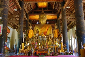 Buddha Statue at Vat Visoun (aka Wat Wisunalat) Temple, Luang Prabang, Laos Buddha Statue at Vat Visoun (aka Wat Wisunalat) Temple, Luang Prabang, Laos