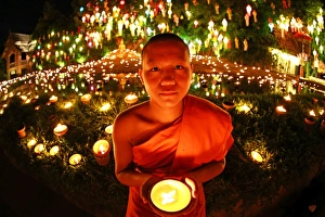 Buddhist Monks at Wat Phan Tao Temple during Loy Krathong in Chiang Mai, Thailand Buddhist Monks at Wat Phan Tao Temple during Loy Krathong in Chiang Mai, Thailand