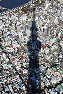 General aerial view of the city skyline with the shadow of the Tokyo Skytree tower, Tokyo General aerial view of the city skyline with the shadow of the Tokyo Skytree tower, Tokyo