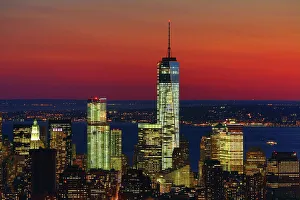 General view of the New York Manhattan city skyline at sunset and One World Trade Center General view of the New York Manhattan city skyline at sunset and One World Trade Center