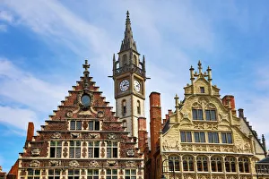 Ghent clock tower and the Vrije Schippers Guildhall, Graslei quay, Ghent, Belgium Ghent clock tower and the Vrije Schippers Guildhall, Graslei quay, Ghent, Belgium