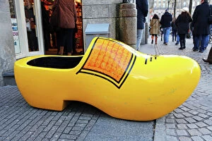 Images Dated 29th December 2013: Giant wooden souvenir clog outside a souvenirs shop for clogs in Amsterdam, Holland