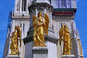 Gold angel statue on the column beside Zagreb Cathedral in Zagreb, Croatia Gold angel statue on the column beside Zagreb Cathedral in Zagreb, Croatia