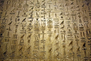 Hieroglyphics on the wall in an underground tomb in the Saqqara Necropolis near Memphis Hieroglyphics on the wall in an underground tomb in the Saqqara Necropolis near Memphis