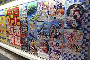 Japanese manga and anime advertising posters in Akihabara Electric Town in Tokyo, Japan Japanese manga and anime advertising posters in Akihabara Electric Town in Tokyo, Japan
