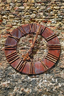 Old rusty clock on the wall beside Zagreb Cathedral in Zagreb, Croatia Old rusty clock on the wall beside Zagreb Cathedral in Zagreb, Croatia