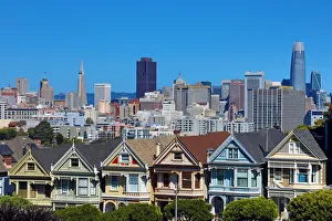 Painted Ladies Victorian houses near Alamo Square and city skyline, San Franciso Painted Ladies Victorian houses near Alamo Square and city skyline, San Franciso