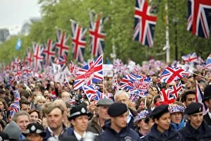 Images Dated 5th June 2012: Patriotic crowds waving union jack flags at the Queen Elizabeth II Diamond Jubilee Celebrations