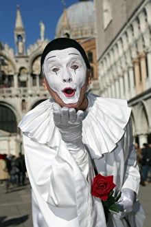 People wearing masks and costumes at the Venice Carnival People wearing masks and costumes at the Venice Carnival