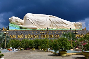 Reclining Buddha statue at Vinh Trang Temple, near My Tho, Mekong Delta, Vietnam Reclining Buddha statue at Vinh Trang Temple, near My Tho, Mekong Delta, Vietnam