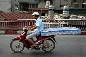 Images Dated 13th August 2012: Scooters and traffic in Hanoi, Vietnam