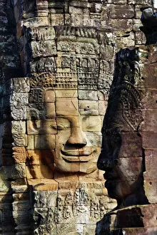 Mysterious Gallery: Stone head and face at Bayon Khmer Temple, Angkor Thom, Cambodia