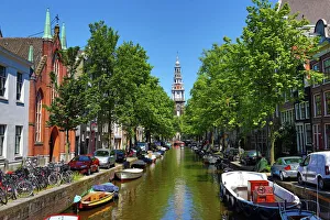Tower of the Zuiderkerk, southern church, and the Groenburgwal canal in Amsterdam Tower of the Zuiderkerk, southern church, and the Groenburgwal canal in Amsterdam