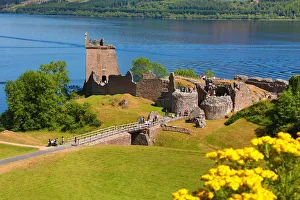 Urquhart Castle and Loch Ness in the Scottish Highlands near Drumnadrochit, Scotland Urquhart Castle and Loch Ness in the Scottish Highlands near Drumnadrochit, Scotland