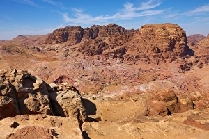 View of sandstone rock formations overlooking the valley of the rock city of Petra View of sandstone rock formations overlooking the valley of the rock city of Petra
