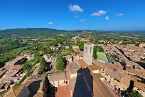 View from the Torre Grossa over the rooftops of San Gimignano and the Tuscan countryside View from the Torre Grossa over the rooftops of San Gimignano and the Tuscan countryside