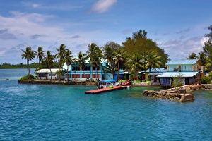 Waterfront houses in Koror, Koror Island, Republic of Palau, Micronesia, Pacific Ocean Waterfront houses in Koror, Koror Island, Republic of Palau, Micronesia, Pacific Ocean