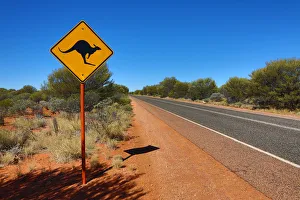 Yellow kangaroo wildife warning sign at Uluru, Ayers Rock, Uluru-Kata Tjuta National Park Yellow kangaroo wildife warning sign at Uluru, Ayers Rock, Uluru-Kata Tjuta National Park