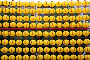 Yellow lanterns at the Longshan Buddhist Temple at Chinese New Year in Taipei, Taiwan Yellow lanterns at the Longshan Buddhist Temple at Chinese New Year in Taipei, Taiwan