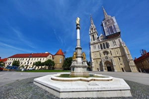 Zagreb Cathedral with tower renovation and Holy Mary Monument column in Zagreb, Croatia Zagreb Cathedral with tower renovation and Holy Mary Monument column in Zagreb, Croatia