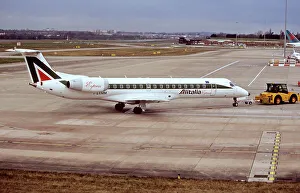 Alitalia Express Embraer ERJ145 on tow at Birmingham Airport UK Alitalia Express Embraer ERJ145 on tow at Birmingham Airport UK