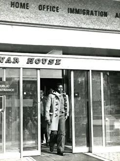 <b class=qtipBold><figcaption>Amin runaway</figcaption></b><br>Ugandan pilot Charles Balidawa, 27, seeking refuge in Britain from President Amin's regime, seen here leaving the Home Office Immigration and Nationality Department in Croydon. Photograph taken; March 14th 1977<br><em>© Flightglobal 2012</em> Amin runaway