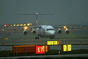 Images Dated 10th December 2004: Avro RJ Flybe dawn at Birmingham Airport UK
