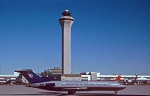 Boeing 727-200 United in front of Denver Airport ATC tower Boeing 727-200 United in front of Denver Airport ATC tower
