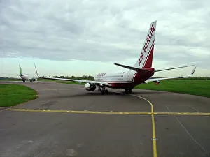 Boeing 737-800 Air Berlin taxiing in queue at Stansted Airport Boeing 737-800 Air Berlin taxiing in queue at Stansted Airport