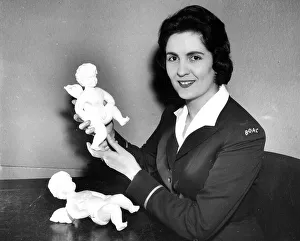 <b class=qtipBold><figcaption>First Commision</figcaption></b><br>A job on the ground as a BOAC receptionist at London Airport does not stop Pauline Rawnsley-Gurd from letting her imagination become airbourne with these handmade cherubs. Published January 22nd 1959<br><em>© Flightglobal</em> First Commision