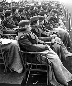 <b class=qtipBold><figcaption>Passing out Parade at Cranwell</figcaption></b><br>Members of the WRAF watch the Passing out Parade at Cranwell. Published 13/12/1960<br><em>© Flightglobal</em> Passing out Parade at Cranwell
