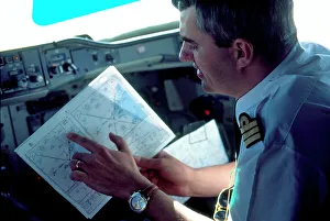 <b class=qtipBold><figcaption>Pilot looking at map</figcaption></b><br>A300 Air France 1st officer (c) de Malglaive The Flight Collection 020 8652 8888<br><em>© Flight Global 2009 - All Rights Reserved</em> Pilot looking at map