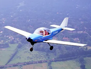 <b class=qtipBold><figcaption>Trago Mills SAH-1</figcaption></b><br>Trago Mills, SAH-1, G-SAHI, GA, light, aircraft, action, a-a, 3/4, front, single prop, twin seater, flying over, suburbia, fields<br><em>© Flight Global 2009 - All Rights Reserved</em> Trago Mills SAH-1