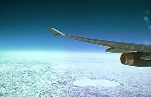 Boeing 747 Gallery: View from Boeing 747-400 flying over snowy fields