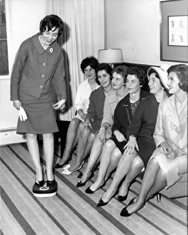 <b class=qtipBold><figcaption>Weighing in for a Glamour Job</figcaption></b><br>The tell take scale reveals that Pan amercian stewardess to be Marjorie Armstrong is well below the limit of 135 pounds. Published November 4th 1960.<br><em>© Flightglobal</em> Weighing in for a Glamour Job
