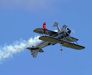 <b class=qtipBold><figcaption>Wing Walking on Boeing Stearman</figcaption></b><br>The inverted Stearman with the wingwalker on the lower wing<br><em>© Flight Global 2009 - All Rights Reserved</em> Wing Walking on Boeing Stearman