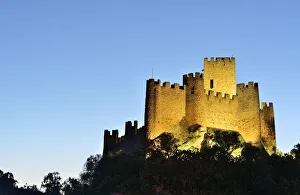 The 12th century mighty Templar castle of Almourol at sunset. Portugal The 12th century mighty Templar castle of Almourol at sunset. Portugal