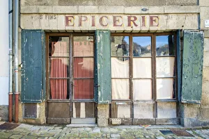 Abandoned storefront vintage painted sign of old Epicerie market store, Aubusson Abandoned storefront vintage painted sign of old Epicerie market store, Aubusson
