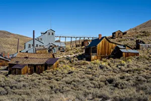 Abandoned wooden structures in Bodie ghost town against clear sky, Mono County Abandoned wooden structures in Bodie ghost town against clear sky, Mono County