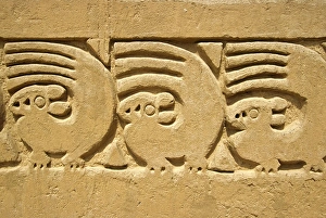 Adobe wall frieze incorporating sea otter and wave Adobe wall frieze incorporating sea otter and wave