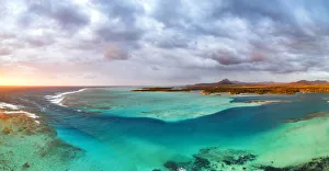 Aerial panoramic of turquoise lagoon and Ile aux Cerfs island, Trou d'Eau Douce Aerial panoramic of turquoise lagoon and Ile aux Cerfs island, Trou d'Eau Douce